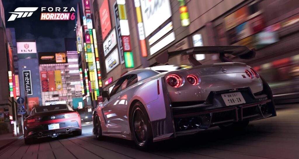 wo Nissan sports cars, including a silver GT-R NISMO, racing through a vibrant, neon-lit Shinjuku street at night in Forza Horizon 6.