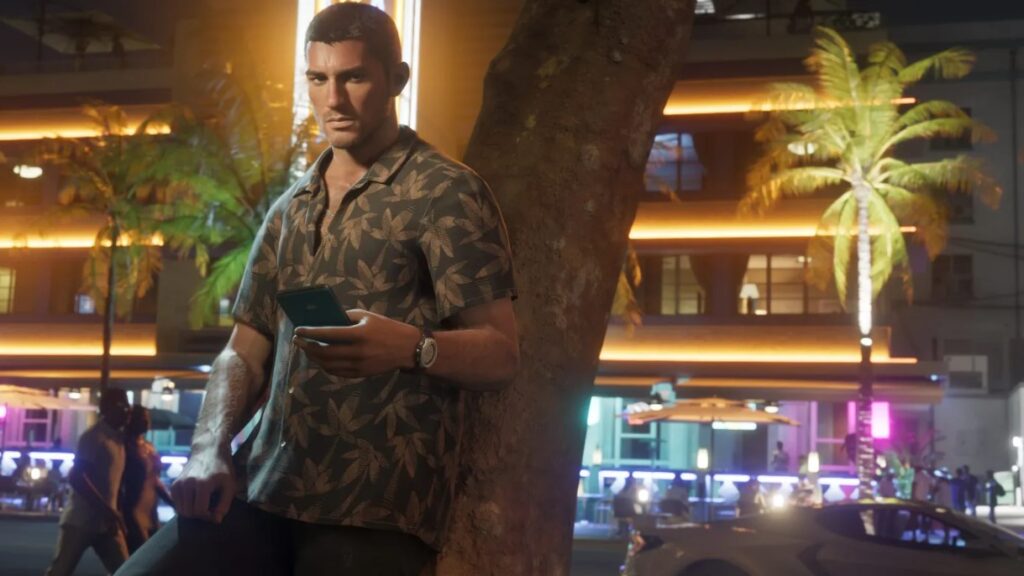 Jason leans against a palm tree amidst the vibrant, neon-soaked streets of Vice City.